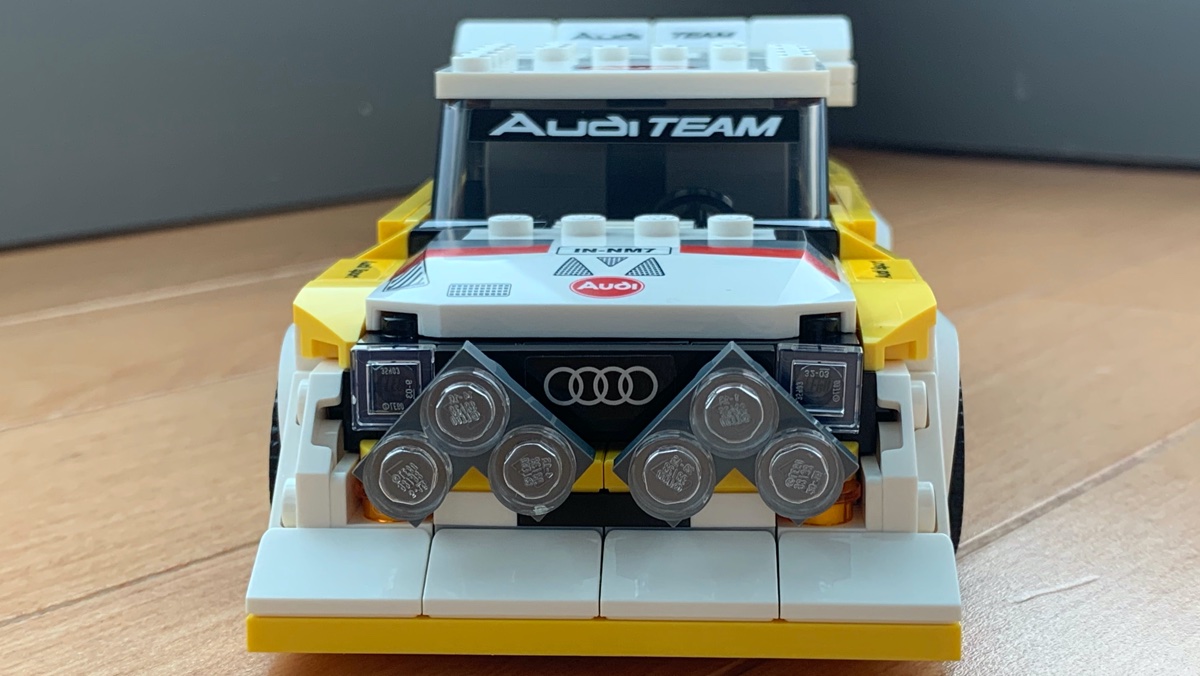 The front of the Audi with the twin spotlight banks mounted. The deep front splitter and squared off looks capture this 80s rally monster perfectly.