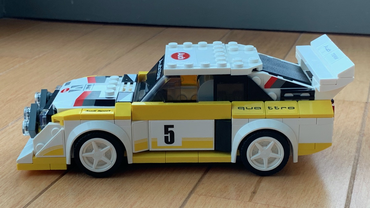 Side view of the LEGO S1 quattro showing off the high level of brick built detail in the model, with four different levels to the side of the model.