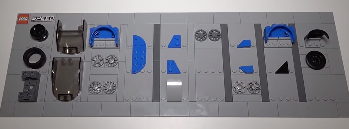 A neat display the team created of the components they've added to LEGO over 5 product releases on Speed Champions. My guess is that time runs left to right, as the new black MINI wheel arch is at the top right.