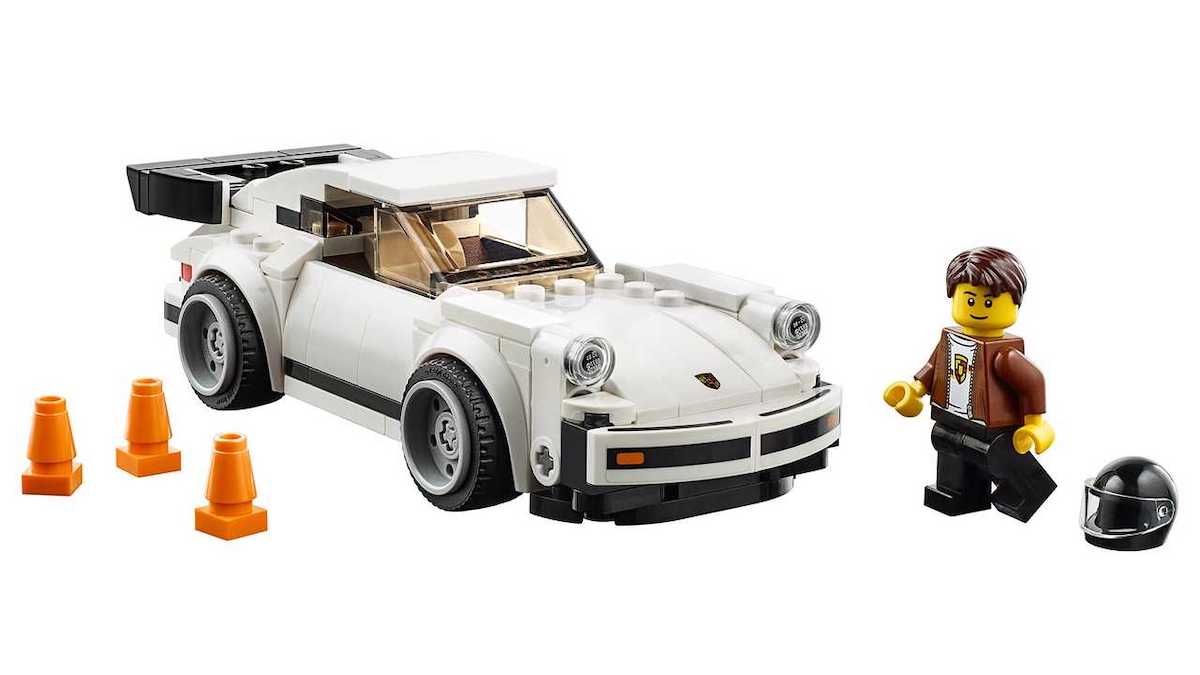 The new white 1974 Porsche 911 Turbo 3.0 model joining the Speed Champions range, with the cone accessory and minifigure wearing its historic Porsche shirt