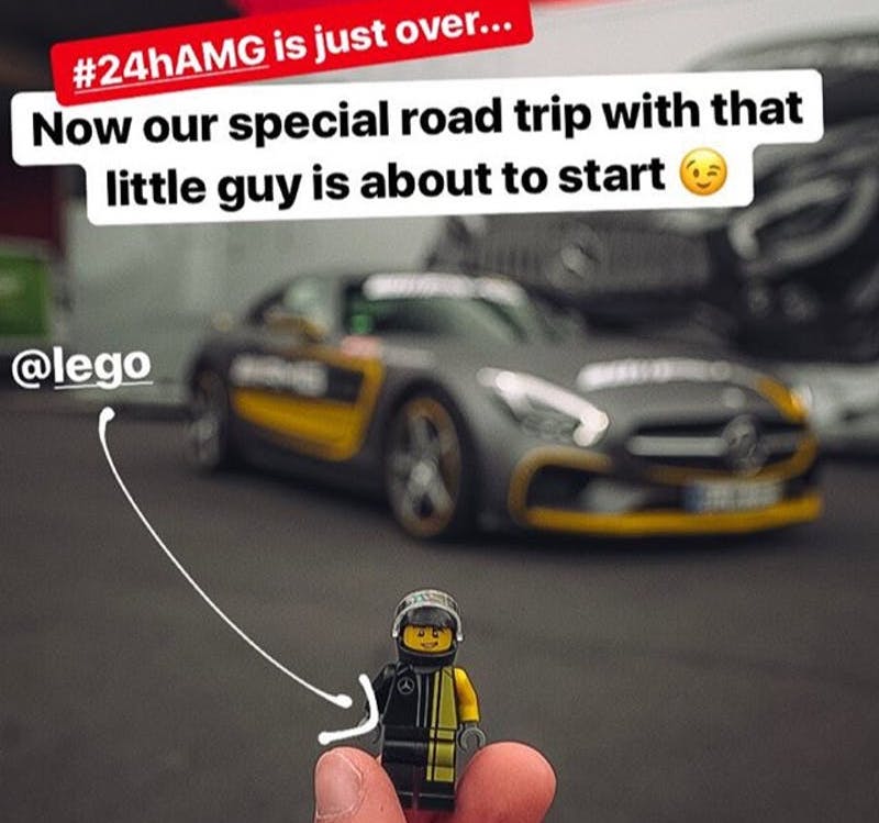 This minifig of a Mercedes driver made it along in the AMG GT for the trip from Nurburgring to Billund. Image © Mercedes via Instagram.