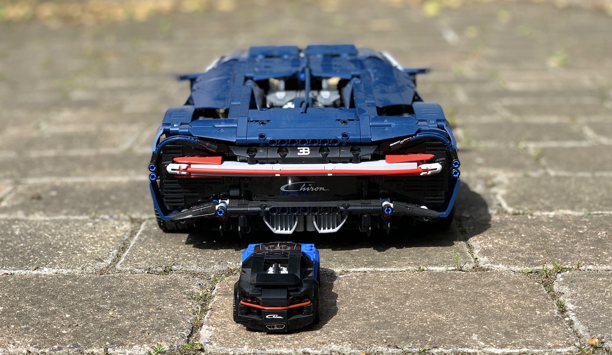 The rubber band as a rear light is a neat trick and looks great for the scale. Both cars capture the width of the real Bugatti Chiron in their own way