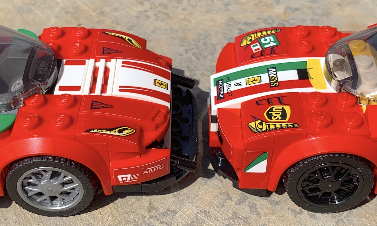 The LEGO Speed Champions Ferrari 458 Italia GT2 face to face with the 2018 488 GT3. The additional use of curved slops is obvious seeing the two cars like this, along with the detail added by having studs sideways (front aero) and even upside down (front splitter).