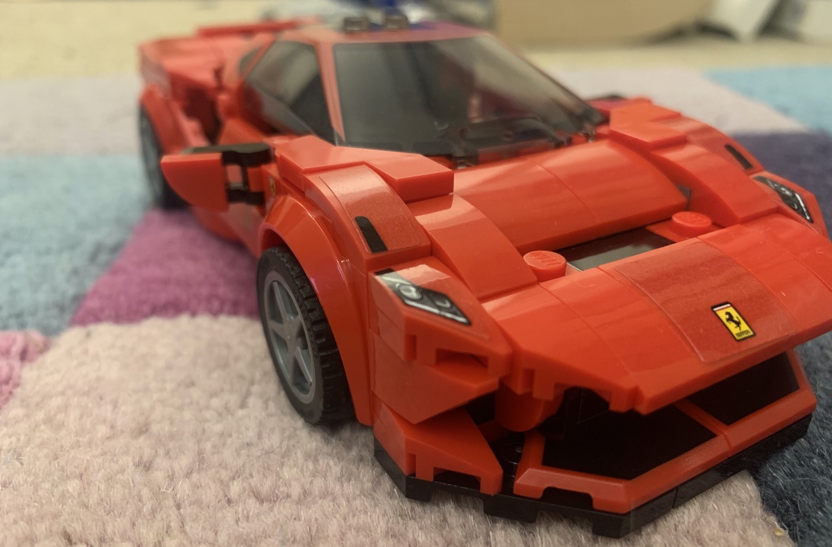 A low sleek front with a deep splitter matches the real world design cues of the F8 - it's a shame LEGO couldn't get a better colour match between the stickers and the red bricks used.