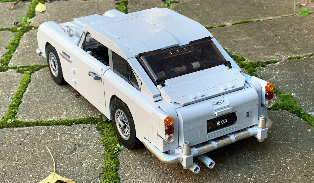 The rear of the Aston Martin DB5 model. With these classic cars LEGO can definitely use blockier styling and still do a good job of representing the original vehicle. The two rods visible underneath the model control the bulletproof shield at the back of the model and the ejector seat.