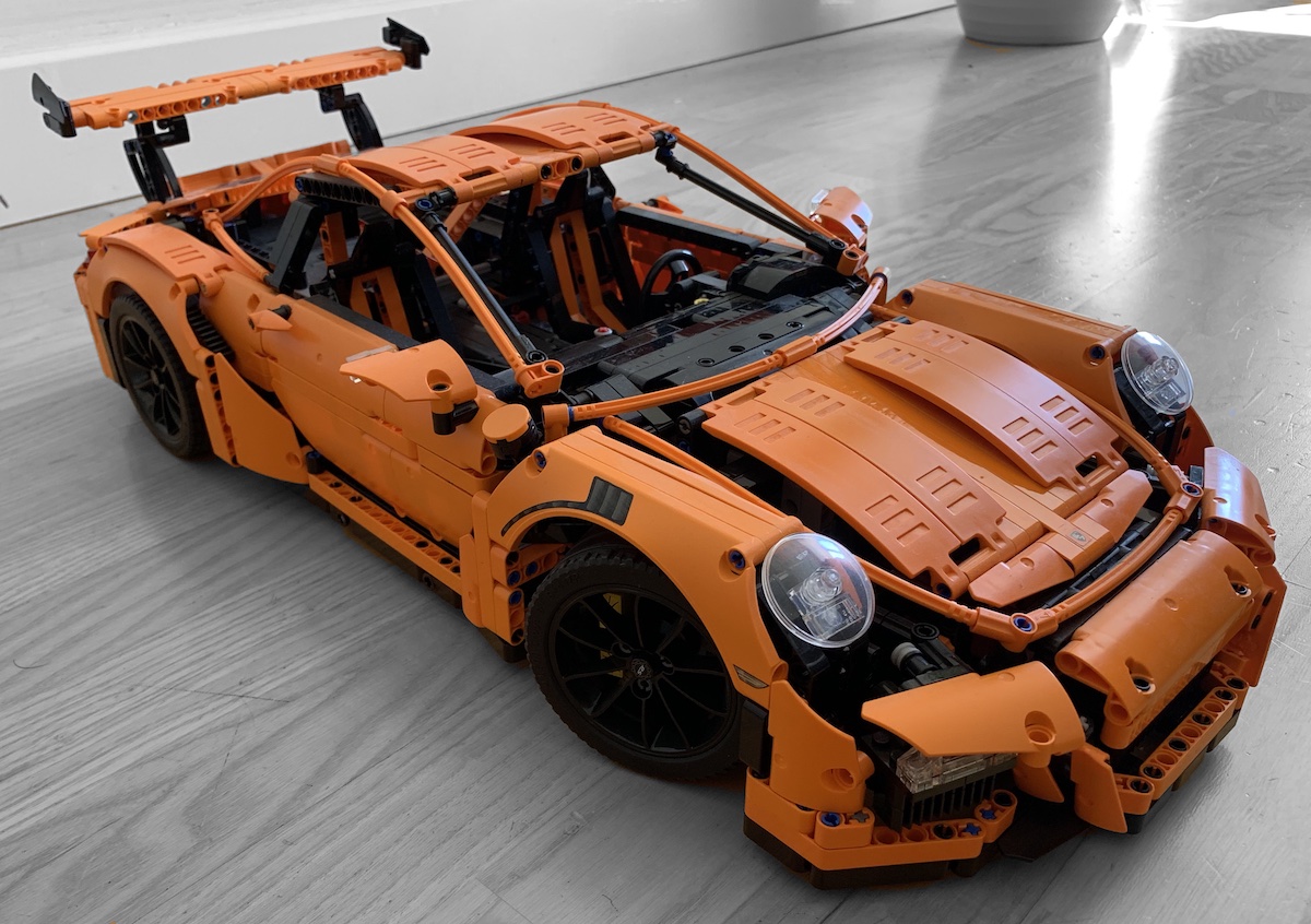 The LEGO Technic Porsche 911 GT3 RS, set 42056, in Lava Orange.